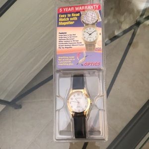 Optics‎ quartz watch. New, magnifying crystal and water resistant black band